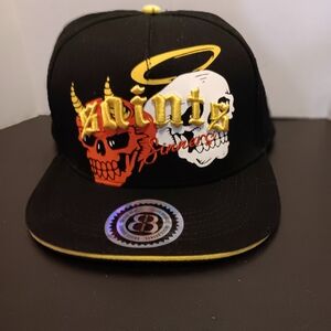 Black Skull Graphic Snapback Hat with Yellow Trim